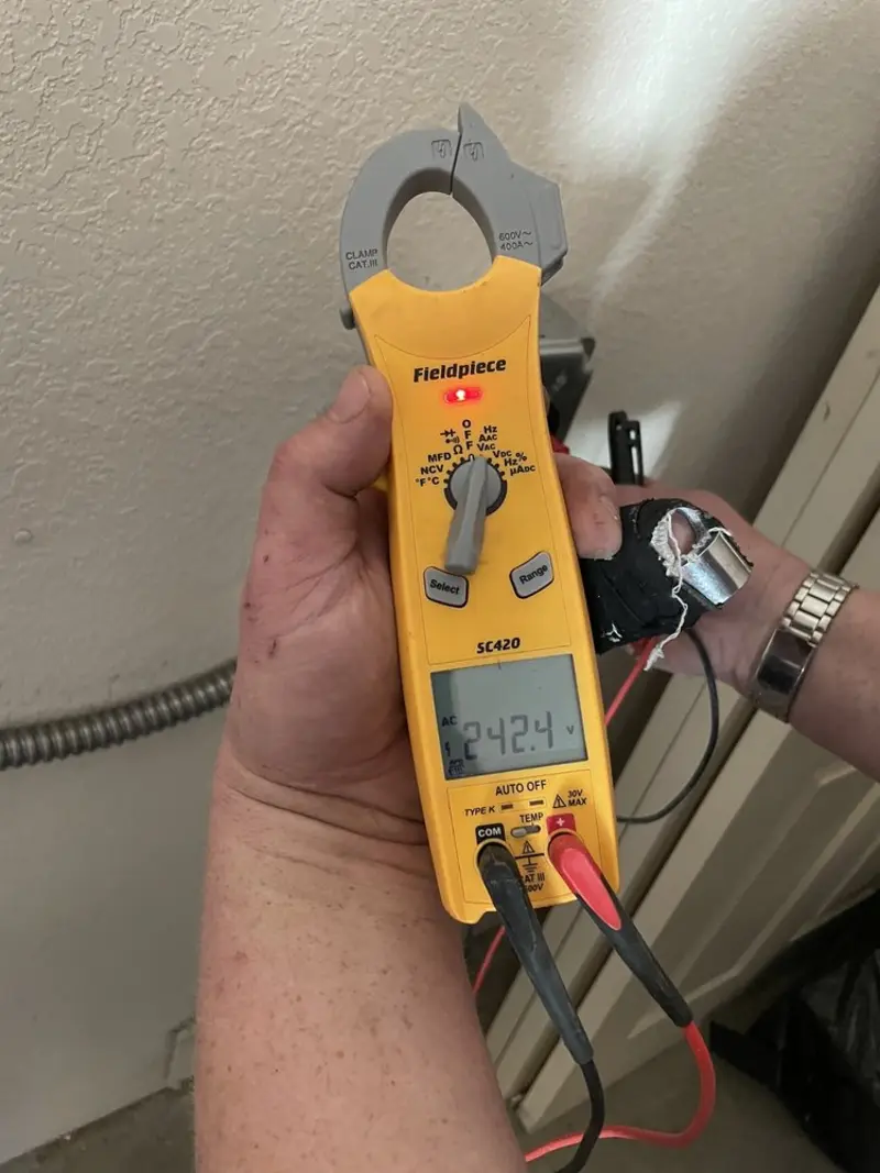 Voltage testing with clamp meter during Electrical Installation Services in Catasauqua